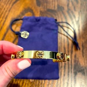 Brand new Tory Burch gold cuff logo bracelet